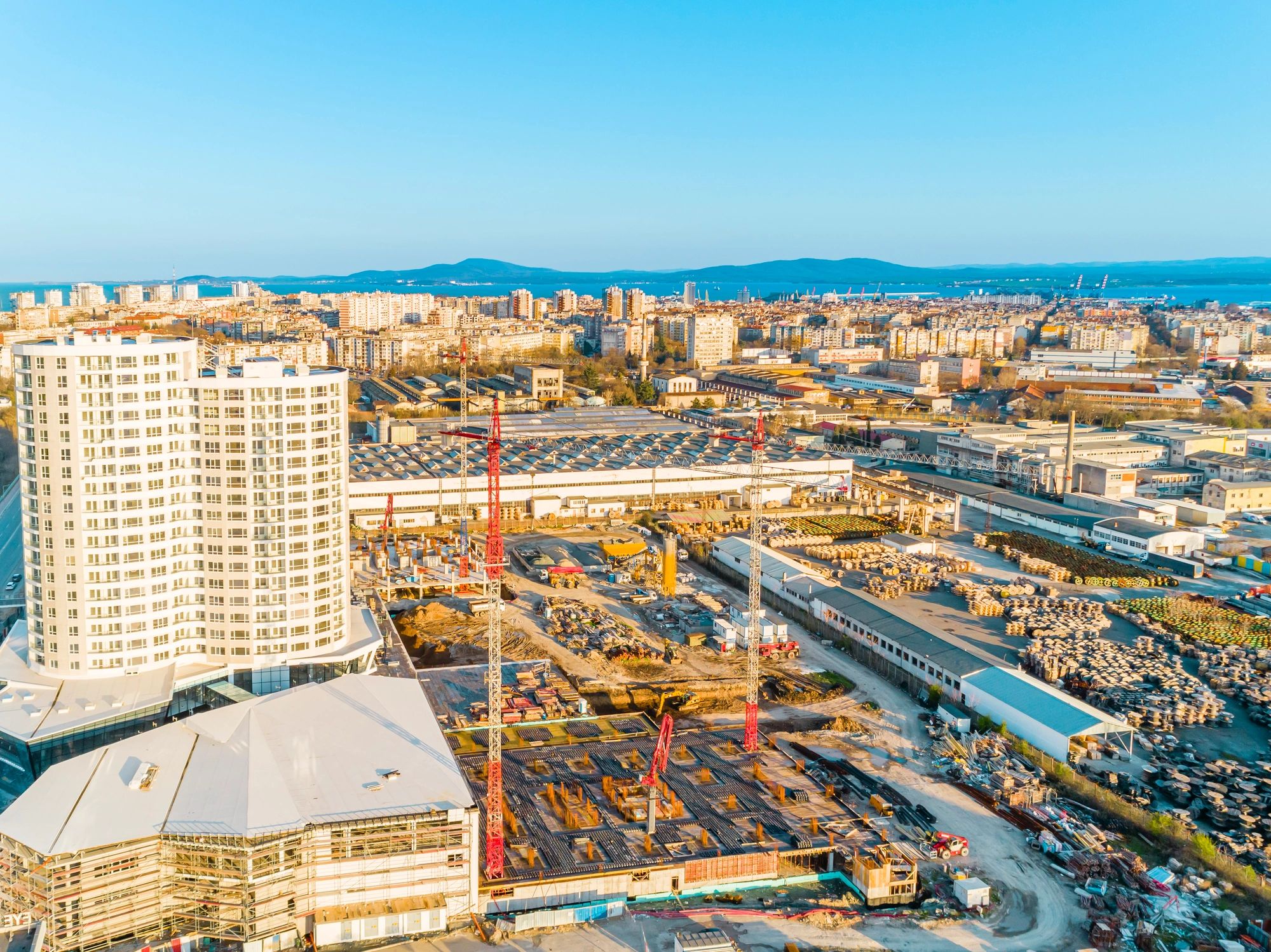 Mid-size buildings under construction for a multifamily development project