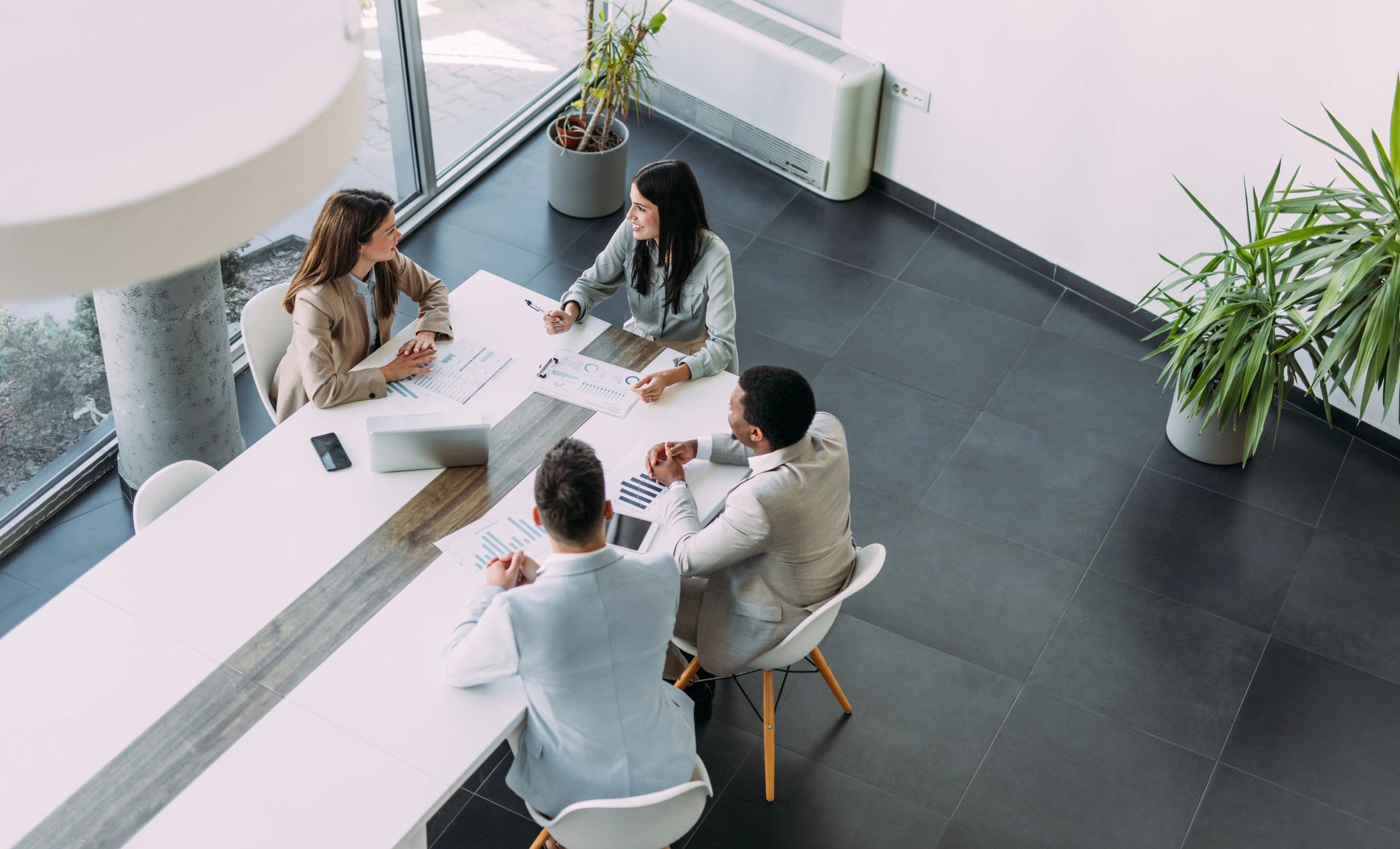Financial professionals meeting in a modern office