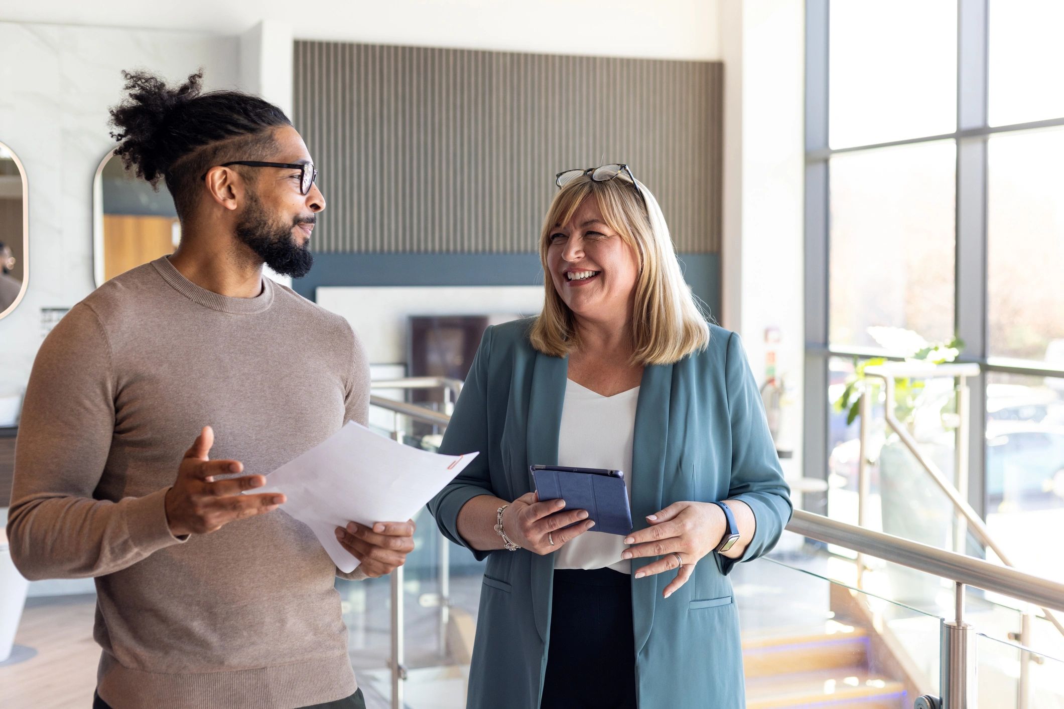 Advisors collaborating with digital tools in an office