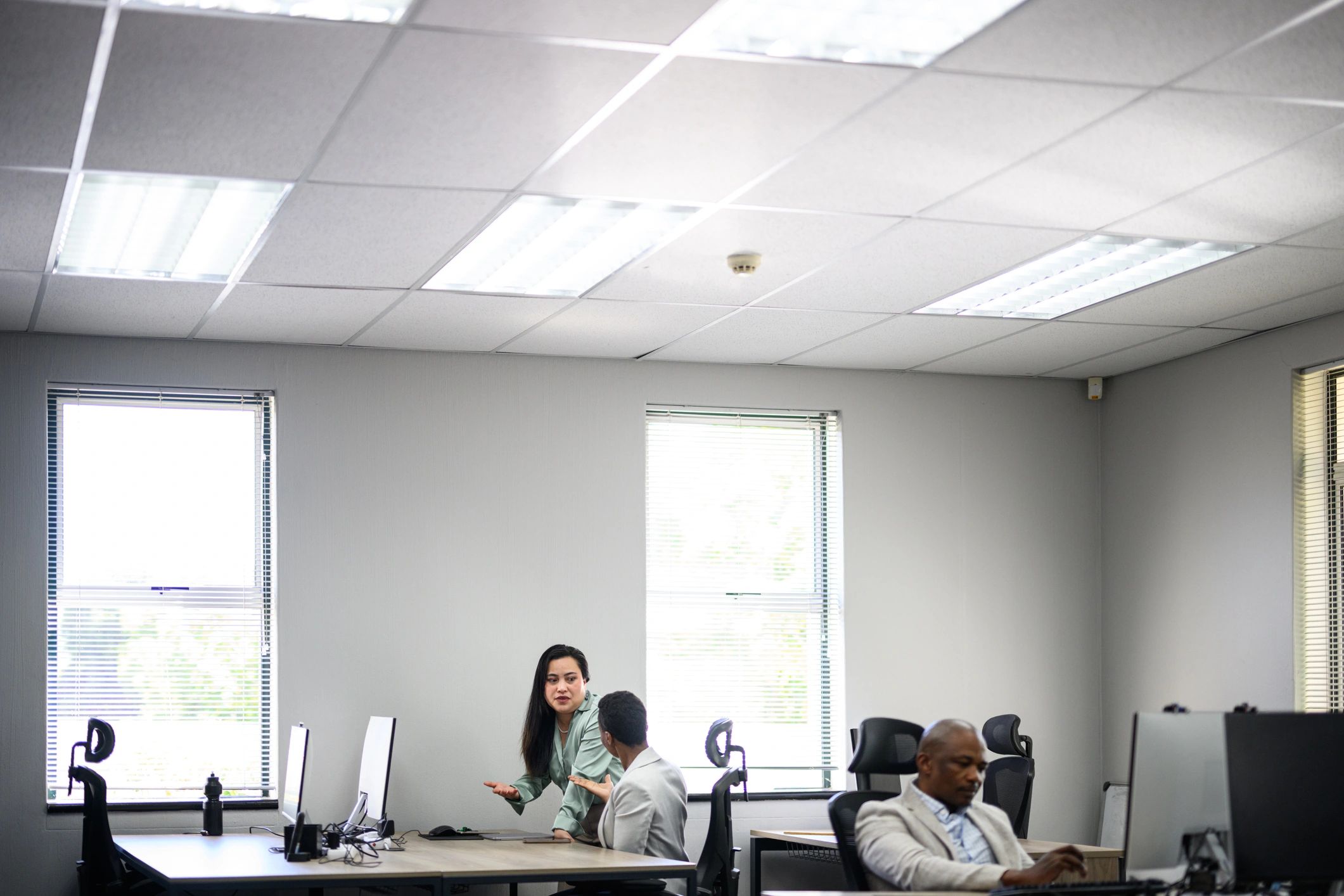 Corporate team working together in a modern office