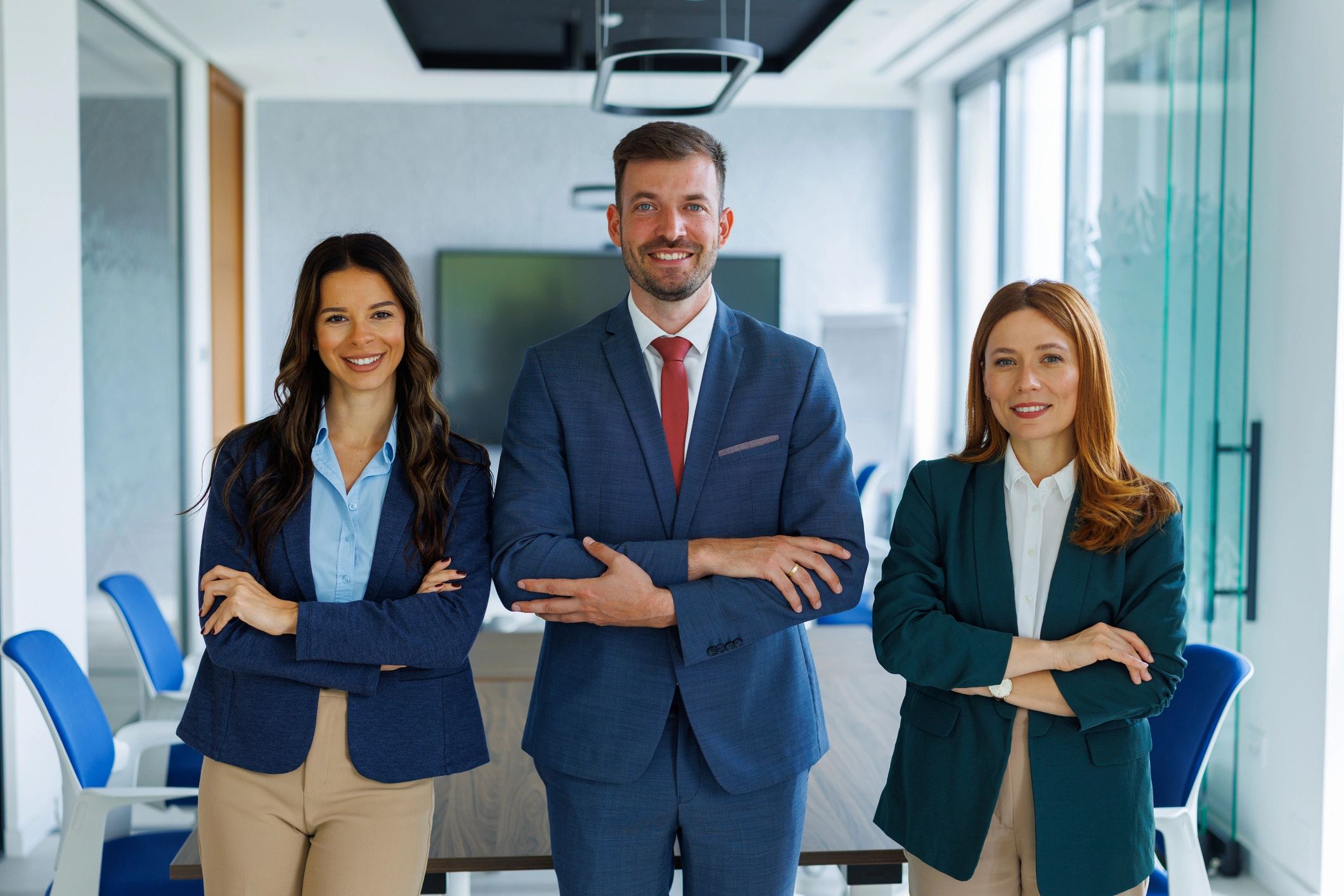 Professional team standing together in an office